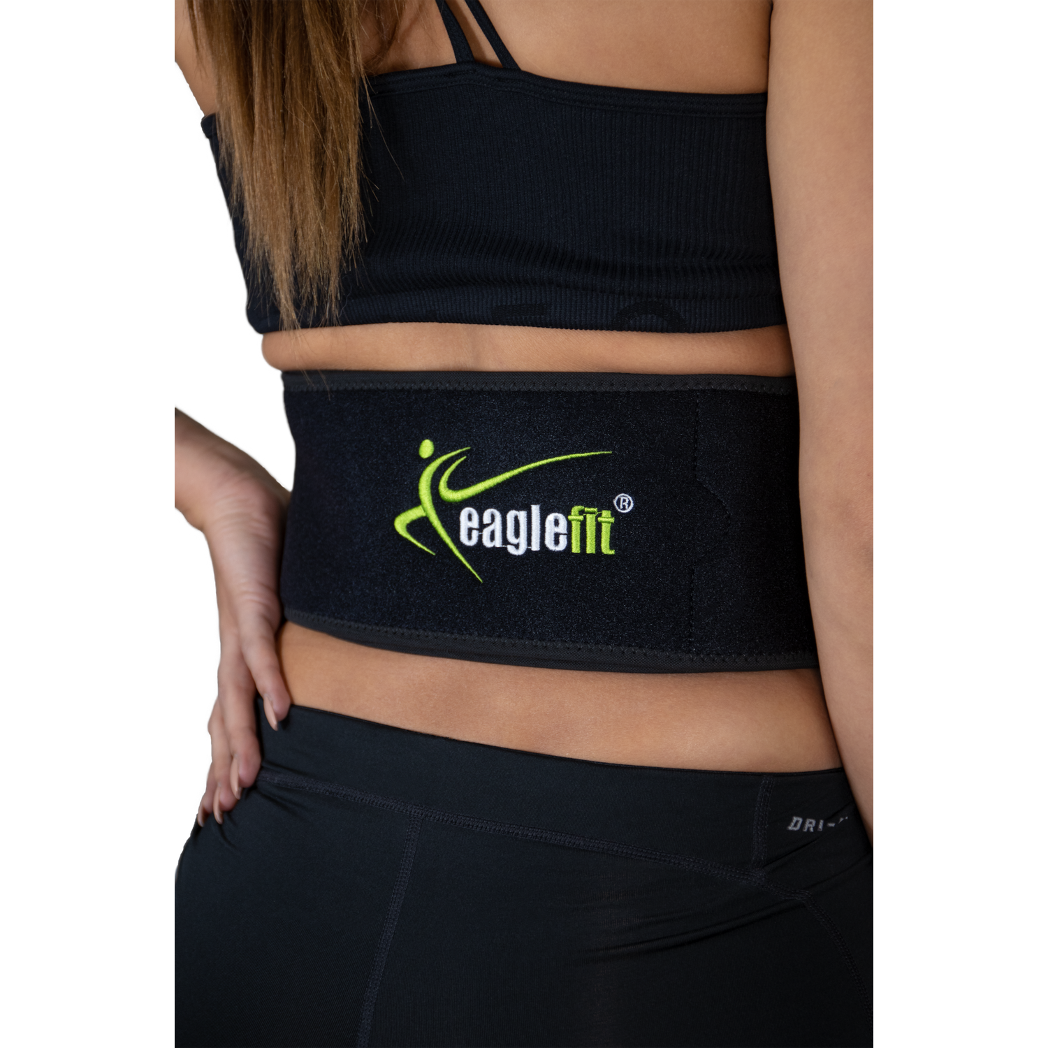 eaglefit EMS BELT worn for effective abdominal and back training, highlighted under clothing.